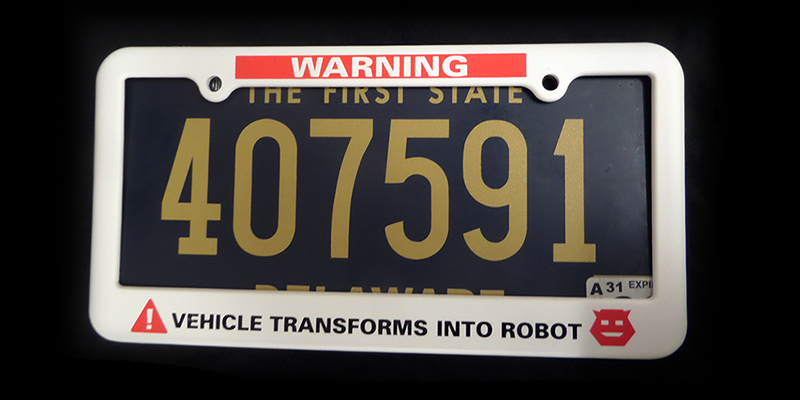 WARNING vehicle transforms into robot license plate holder